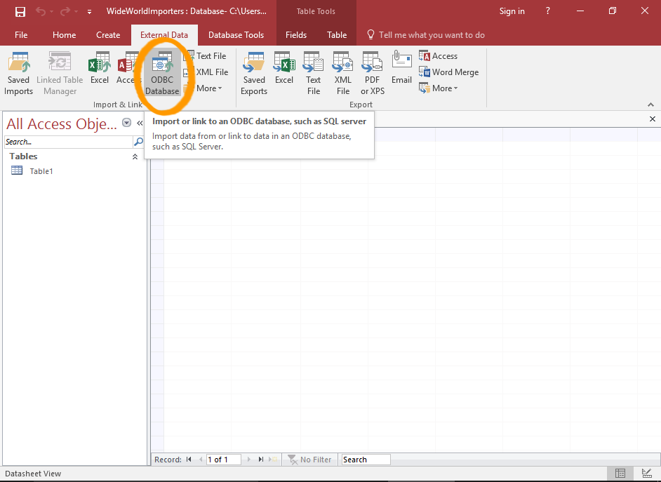 Screenshot of Access with the Import ODBC Database button highlighted