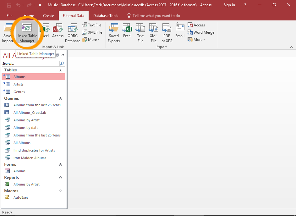 Screenshot of Access with the Linked Table Manager button highlighted